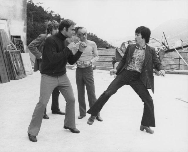 John Saxon, Bruce Lee, and Raymond Chow on the set of Enter The Dragon