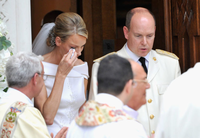 Princess Charlene wipes away a tear on her wedding day 