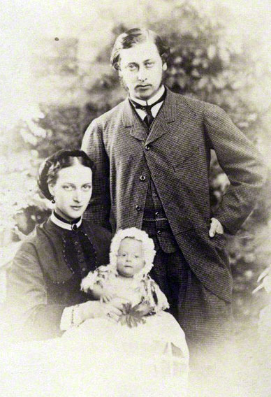 The baby Prince Albert Victor is held by his mother 