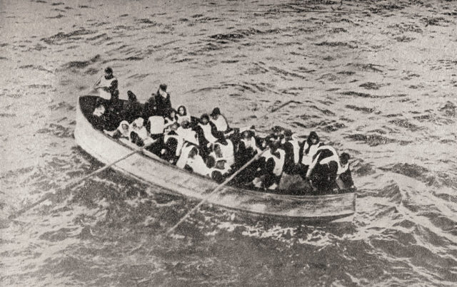 Survivors Of The RMS Titanic In One Of Her Collapsible Lifeboats, similar to the one Rhoda Abbott jumped into. (Photo Credit: Universal History Archive/Universal Images Group via Getty Images)