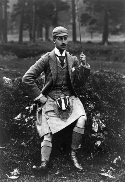 Prince William Albert Victor poses outdoors wearing a kilt