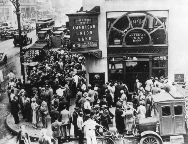 People gathered outside American Union Bank following the stock market crash of 1929.
