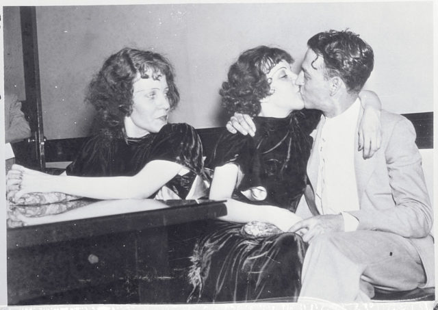 Violet Hilton kissing Maurice Lambert while Daisy watches