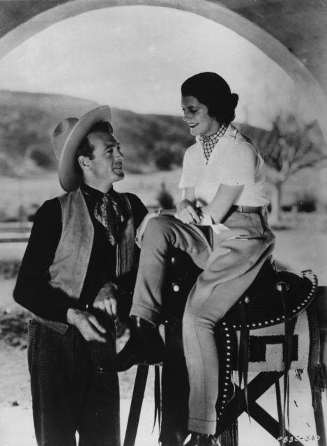 Photo of Gary Cooper and wife Veronica Balfe in cowboy attire