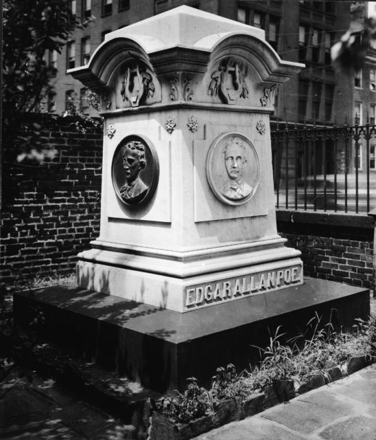 Black and white photo of the grave of Edgar Allan Poe