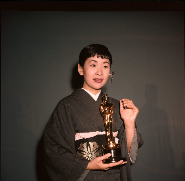Miyoshi Umeki poses with her Academy Award. 