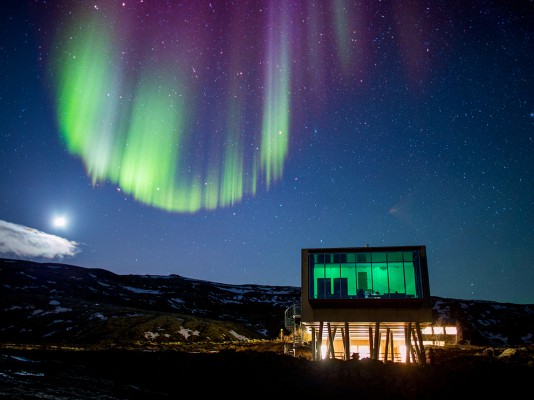Aurora borealis over Hotel ION located by Nesjavellir Power Plant, Iceland. Image shot 2013. Exact date unknown.
