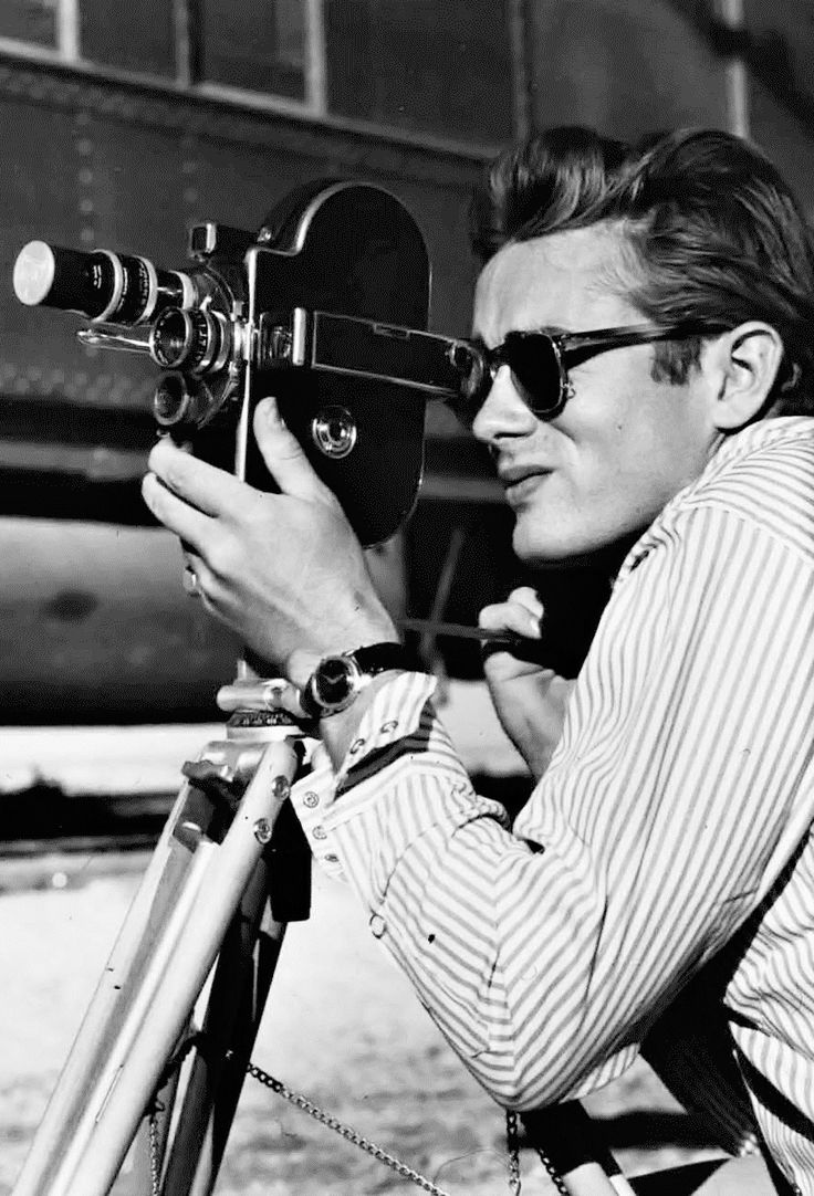 James Dean with a 16mm Bolex camera on the set of GIANT (1955)