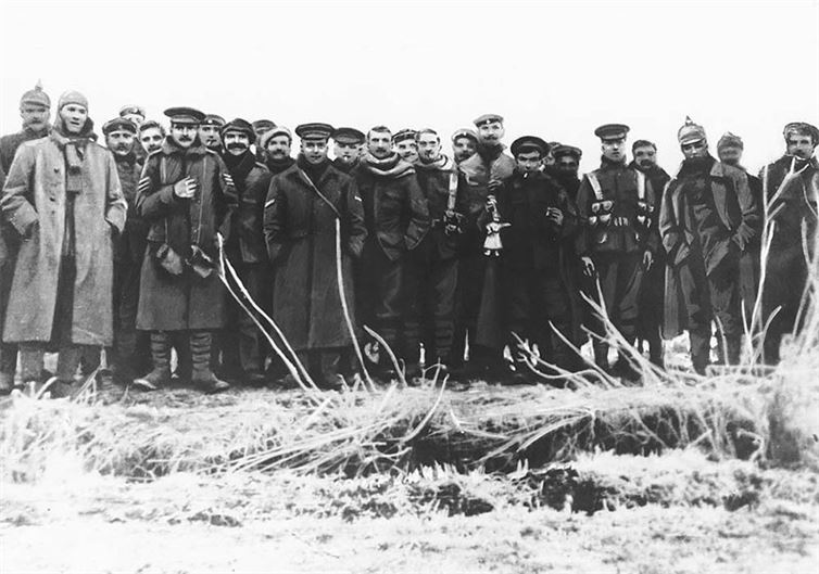 Soldiers on both sides stand together for a snapshot during an impromptu Christmas truce in 1914 during World War One.