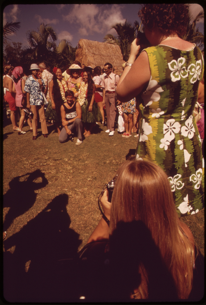 Tourists at a hula dance demonstration, October 1973
