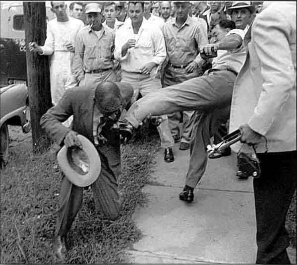 White Christan Mob torturing an African American