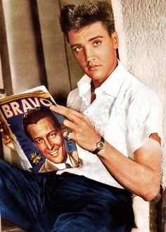 Elvis Reads a Magazine