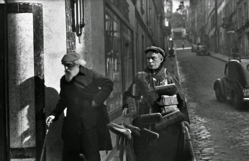 The brooms seller in Montmartre, Paris, 1933. Photo by Henri Cartier-Bresson.