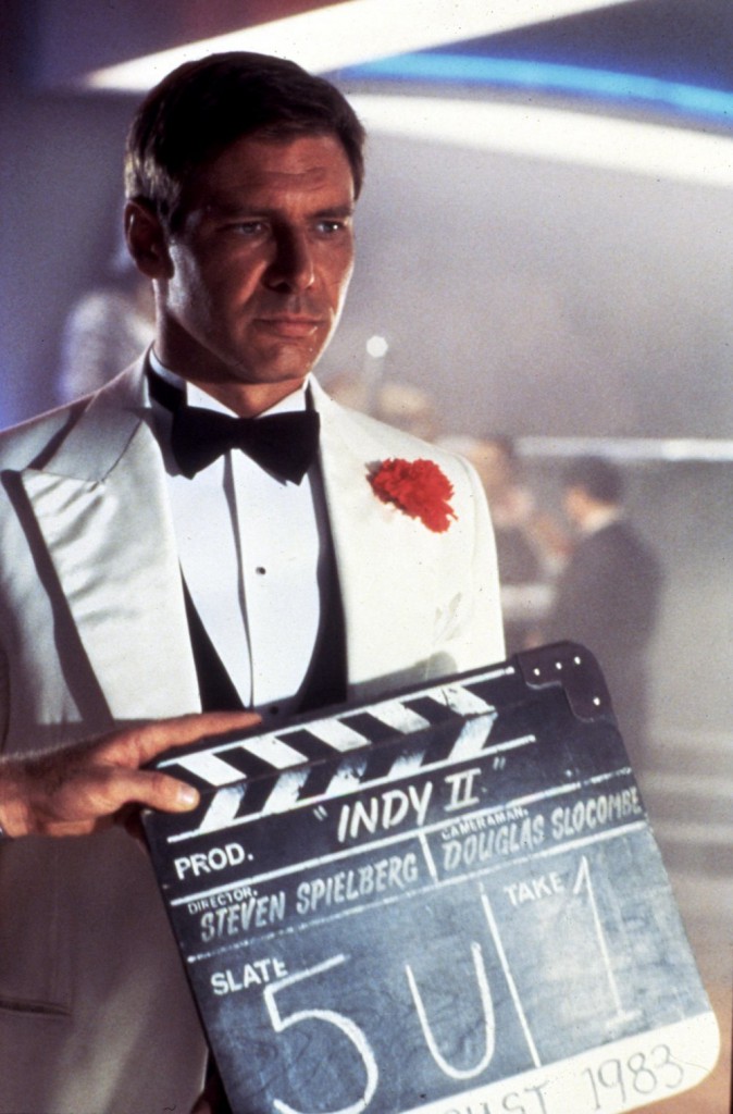 A dinner-jacketed Harrison Ford readies to film the Shanghai nightclub scene that begins ‘Indy II’ 