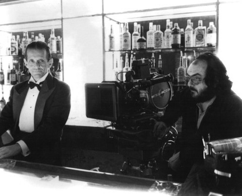 Actor Joe Turkel and director Stanley Kubrick on the Gold Room set of The Shining