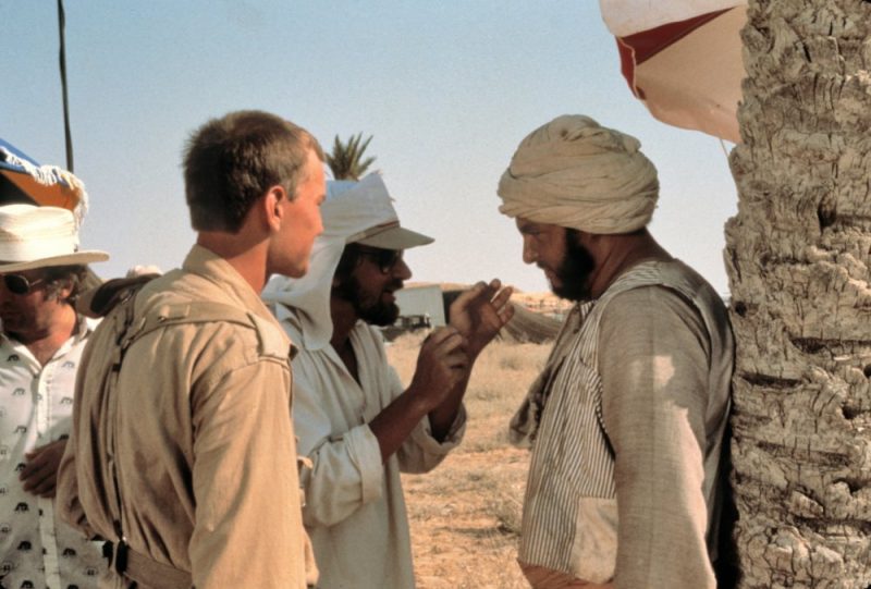Looking the part for a Boy’s Own adventure in the desert, Spielberg gives direction to actor John Rhys-Davies. Davies plays Indy’s friend Sallah, ‘the best digger in Cairo’ 
