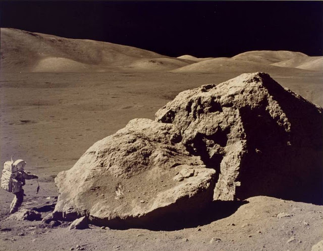 Apollo 17 astronaut Harrison Schmitt collects lunar rock samples