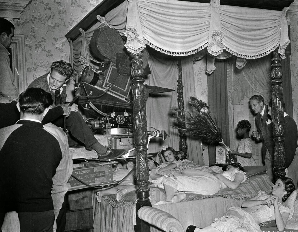 Nap sequence during the barbecue at Twelve Oaks. Director Victor Fleming can be seen with camera on right of bed.