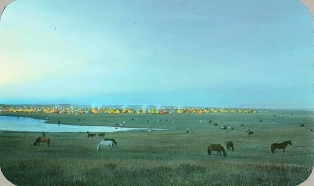 Blackfeet tribal camp with grazing horses. Montana. Early 1900s. Glass lantern slide by Walter McClintock. Source -Yale Collection of Western Americana, Beinecke Rare Book and Manuscript Library.