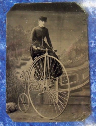 Woman riding a penny farthing, ca. 1890s