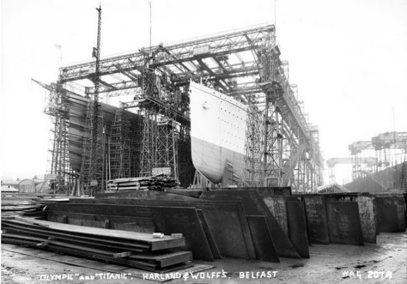 Erecting the giant Arrol Gantry over the slipways for Olympic and Titanic. source