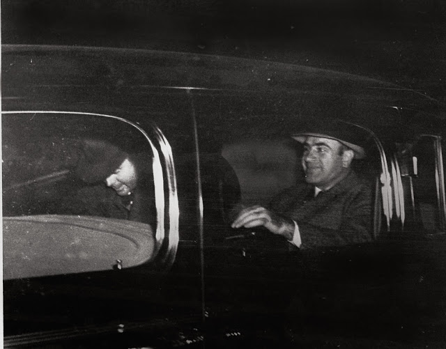 Al Capone, right, leaving Harrisburg, Pa. with a federal officer for Lewisburg, Pa., where he was released after spending seven years in prison in Atlanta and San Francisco’s Alcatraz, Nov. 16, 1939