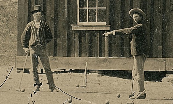Detail from a photo authenticated in 2015 of Billy the Kid (left) playing croquet in New Mexico in 1878