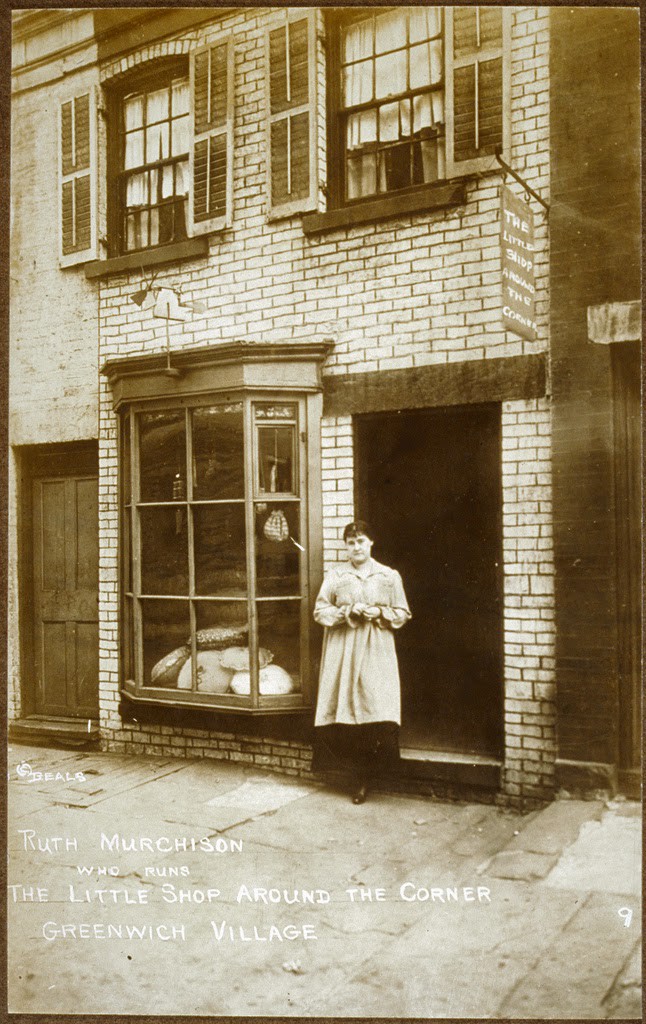 Ruth Murchison standing in front of the entrance to The Little Shop Around the Corner, ca. 1912-1926. Photo credit: Schlesinger Library on the History of Women in America