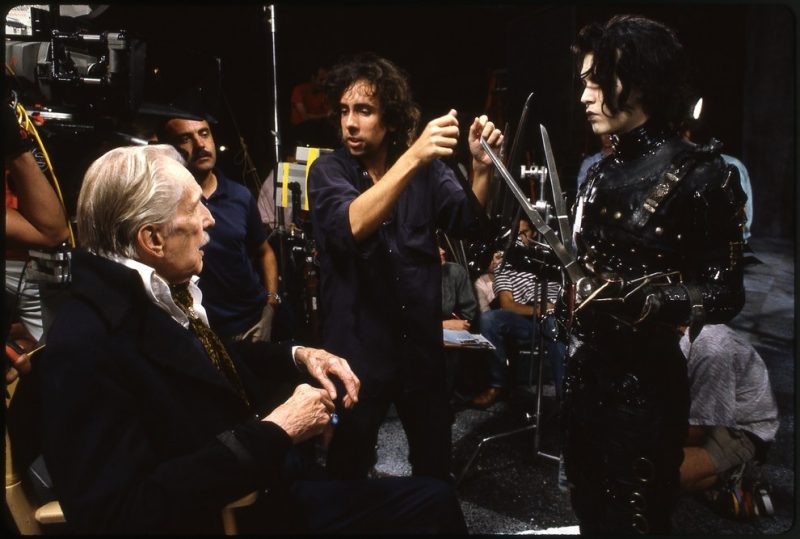 Tim Burton chats with Johnny Depp and Vincent Price during filming for one of Edward’s flashbacks. Credit-20th Century Fox