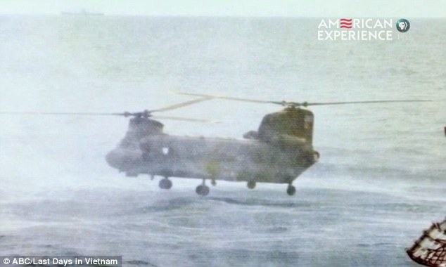 After saving his family, the pilot set the helicopter down onto the sea