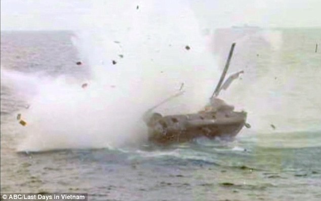 The helicopter blew up dramatically as the pilot banked it into the sea as he leaped out after jettisoning his family

