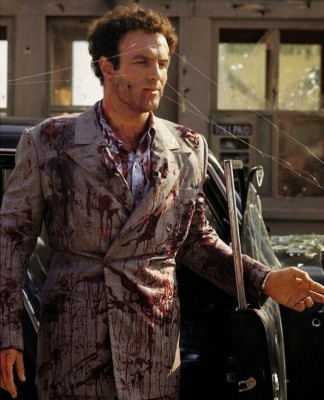 James Caan takes a break during filming of the tollbooth assassination scene in which his character, Sonny Corleone