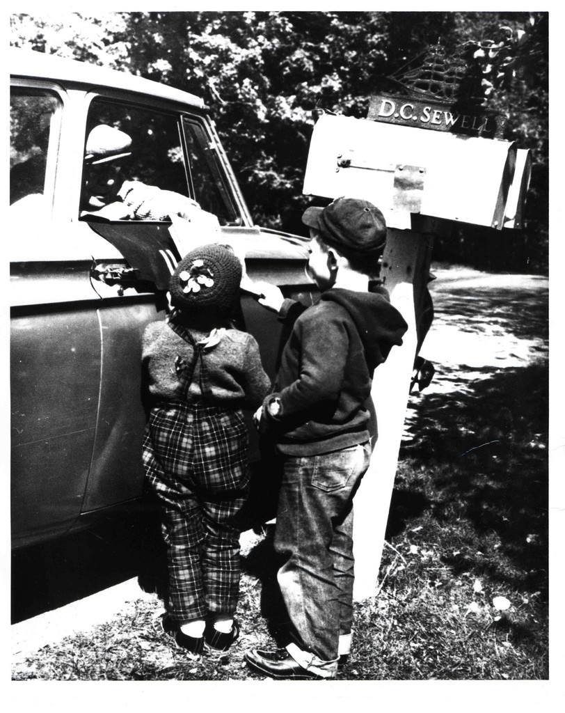 .Rural Carrier Greeted by Children 1935