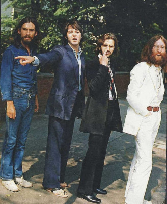 George Harrison, Paul McCartney, Ringo Starr and John Lennon waiting to cross Abbey Road