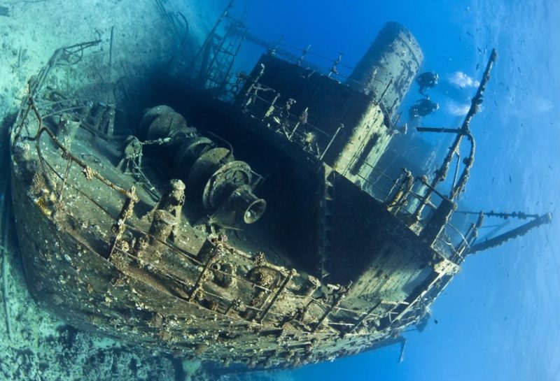 A pair of divers explore the 100-metre long cargo ship Giannis D, one of the biggest wrecks to be found in the Red Sea. Photo credit Alexander Mustard

