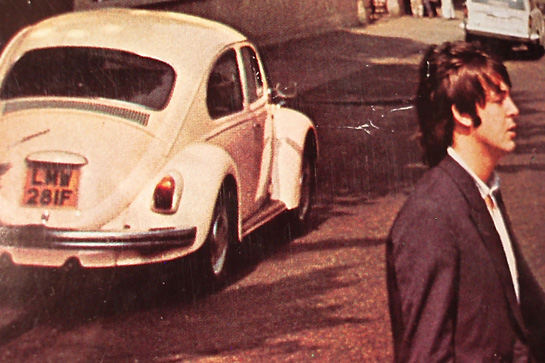 In the background of the cover is a Volkswagen with the possibly cryptic message, “28 IF,” on its license plate. source