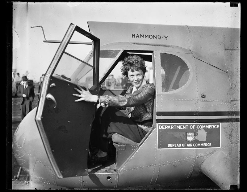 Amelia Earhart in airplane, 1936