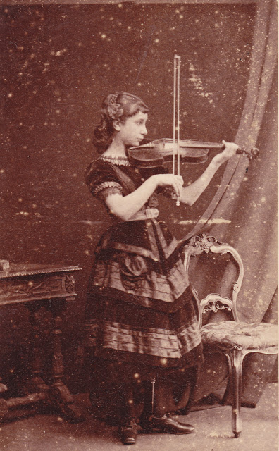 Girl playing on violin, New Jersey, ca. 1870