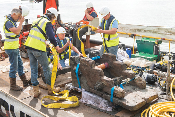 The most substantial artefact to be raised from the London wreck is this gun carriage. It was detected in 2014, but, as the silts around it eroded, the carriage attracted the attention of wood-boring creatures. After having been carefully excavated, the carriage was lifted using a 19-ton crane in August. source