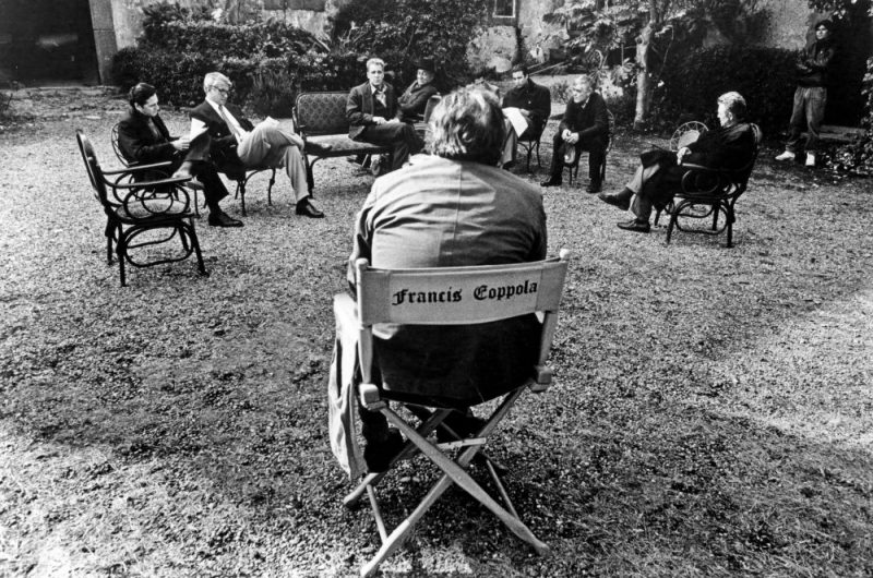 In the director’s chair Francis Ford Coppola oversees a script readthrough for The Godfather Part III (1990)