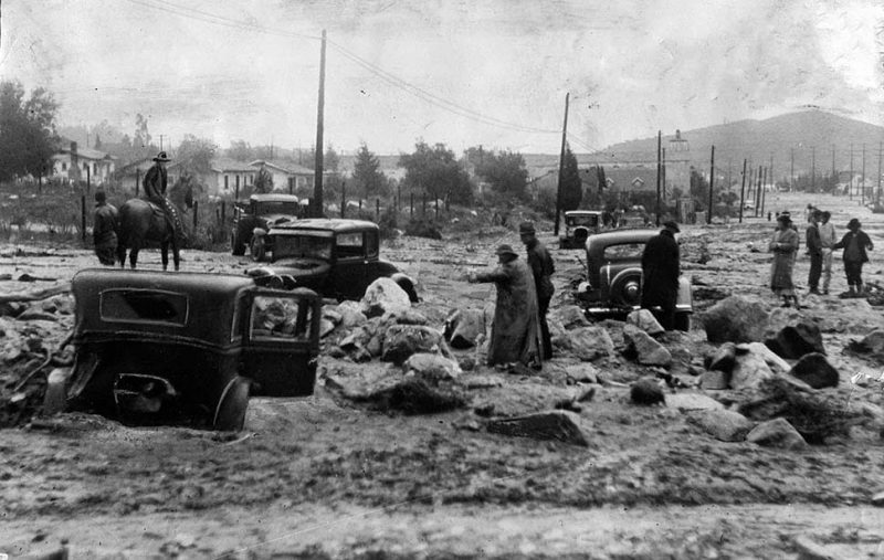 Jan. 1, 1934: Mud, rocks and damaged cars on Montrose Avenue in Montrose, after New Years flooding. This photo was published in the Jan. 2, 1934 Los Angeles Times.
