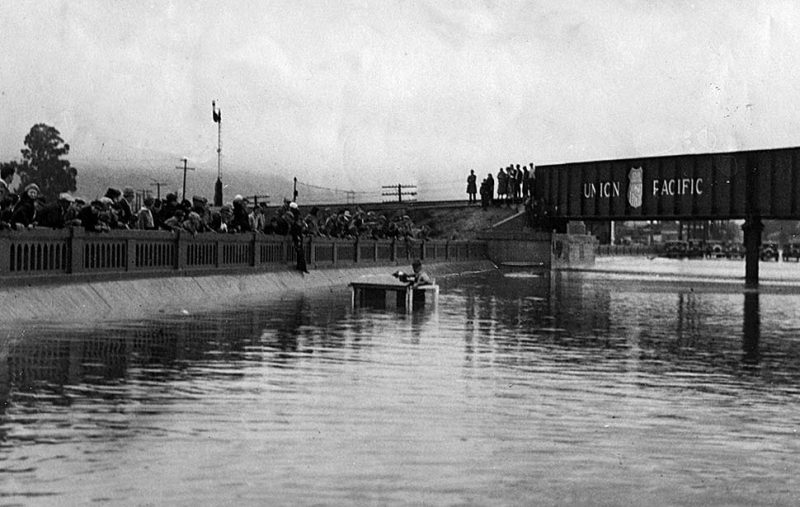 Jan. 1. 1934: A milk truck is almost completely submerged on Whittier Blvd. under Union Pacific railroad bridge. This photo was published in the Jan. 2, 1934 Los Angeles Times.