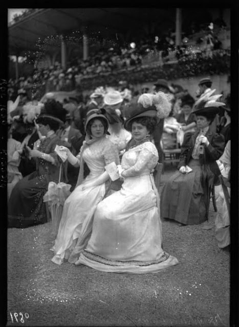 Ladies in Trailing Dresses with Peach Basket Hats (4)