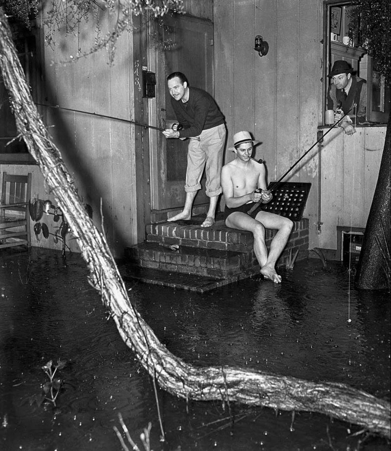 March 2, 1938 Dr. A. J. Gray, left, Douglas Dawson and Dr. A. G. Hobbs do a little fishing at home on 500 block of South New Hampshire.