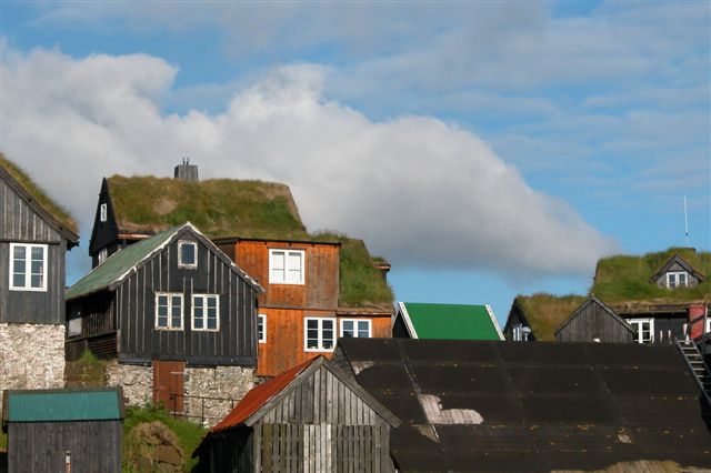 Traditional Faroese houses with turf roof in Reyni, Tórshavn. Most people build larger houses now and with other types of roofs, but the turf roof is still popular in some places.