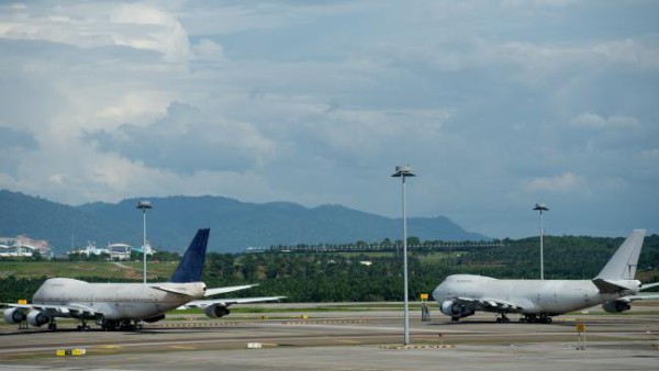 Two are passenger aircraft and one is a cargo plane. 
