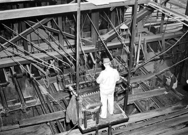 Workers trimming lumber at Lee Tidewater Cypress Company mill - Perry, Florida