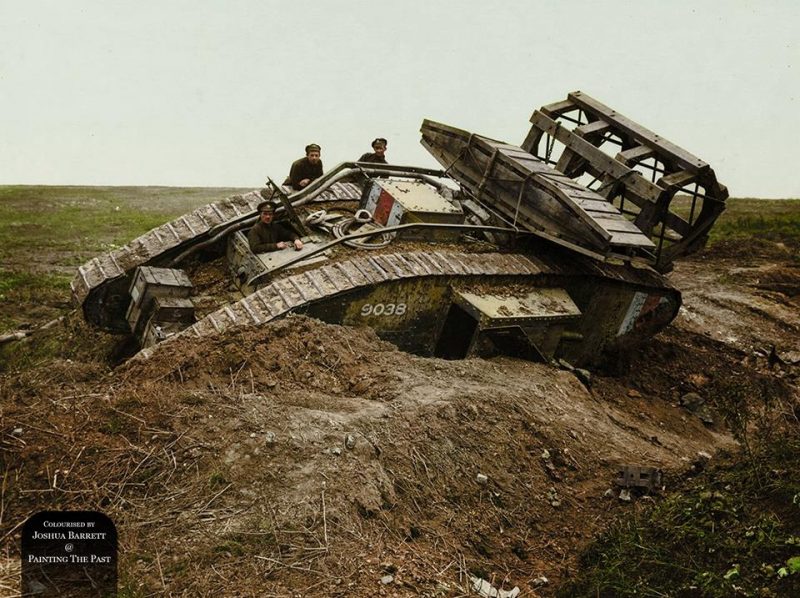 Mk.V tank 9038 of C Coy, 8th Battalion, loaded with wooden bridging material and a specially built contrivance for crossing trenches, stranded in a trench near Cologne Farm, in the Bellicourt section of the Hindenburg Defences, Aisne, Picardie on October 4th. 1918. 9038 was later retrieved and in 1919 was sent to Russia as part of the White Russian Army but captured by the Red Russians on January 1st 1921. (Photo source - Australian War Memorial collection E03832) (Colourised by Joshua Barrett from the UK) https://www.facebook.com/pages/Painting-The-Past/891949734182777?fref=ts