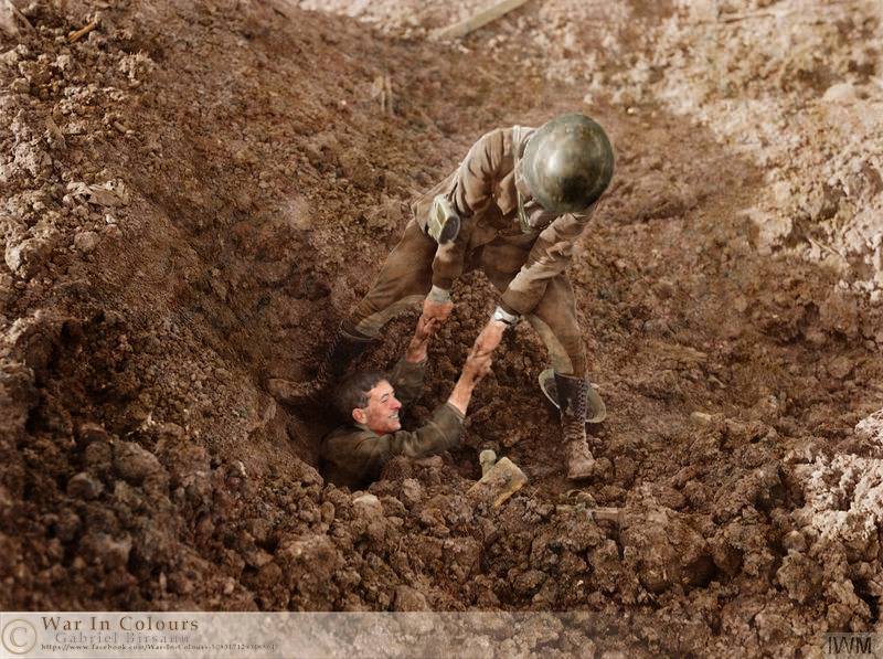 An officer being rescued from a dug-out which has been blown in by shell fire, Mouquet Farm, September 1916. The fighting at Mouquet Farm was the site of nine separate attacks by three Australian divisions between 8 August and 3 September 1916. The farm stood in a dominating position on a ridge that extended north-west from the ruined, and much fought over, village of Pozieres. Although the farm buildings themselves were reduced to rubble, strong stone cellars remained below ground which were incorporated into the German defences. The attacks mounted against Mouquet Farm cost the 1st, 2nd and 4th Australian Divisions over 11,000 casualties, and not one succeeded in capturing and holding it. The British advance eventually bypassed Mouquet Farm leaving it an isolated outpost. It fell, inevitably, on 27 September 1916. (Photo source © IWM Q 1417) Photographer - Lt. Ernest Brooks (Colorised by Gabriel Bîrsanu from Romania) https://www.facebook.com/War-In-Colours-508317129316864/...