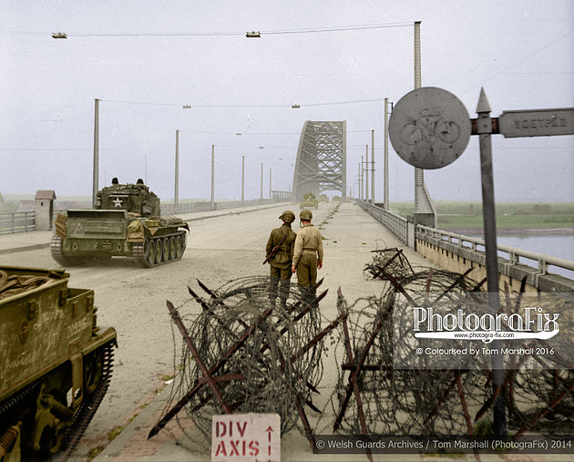 A tank of the 2nd Battalion Welsh Guards passes over Nijmegen bridge in the Netherlands, September 1944.